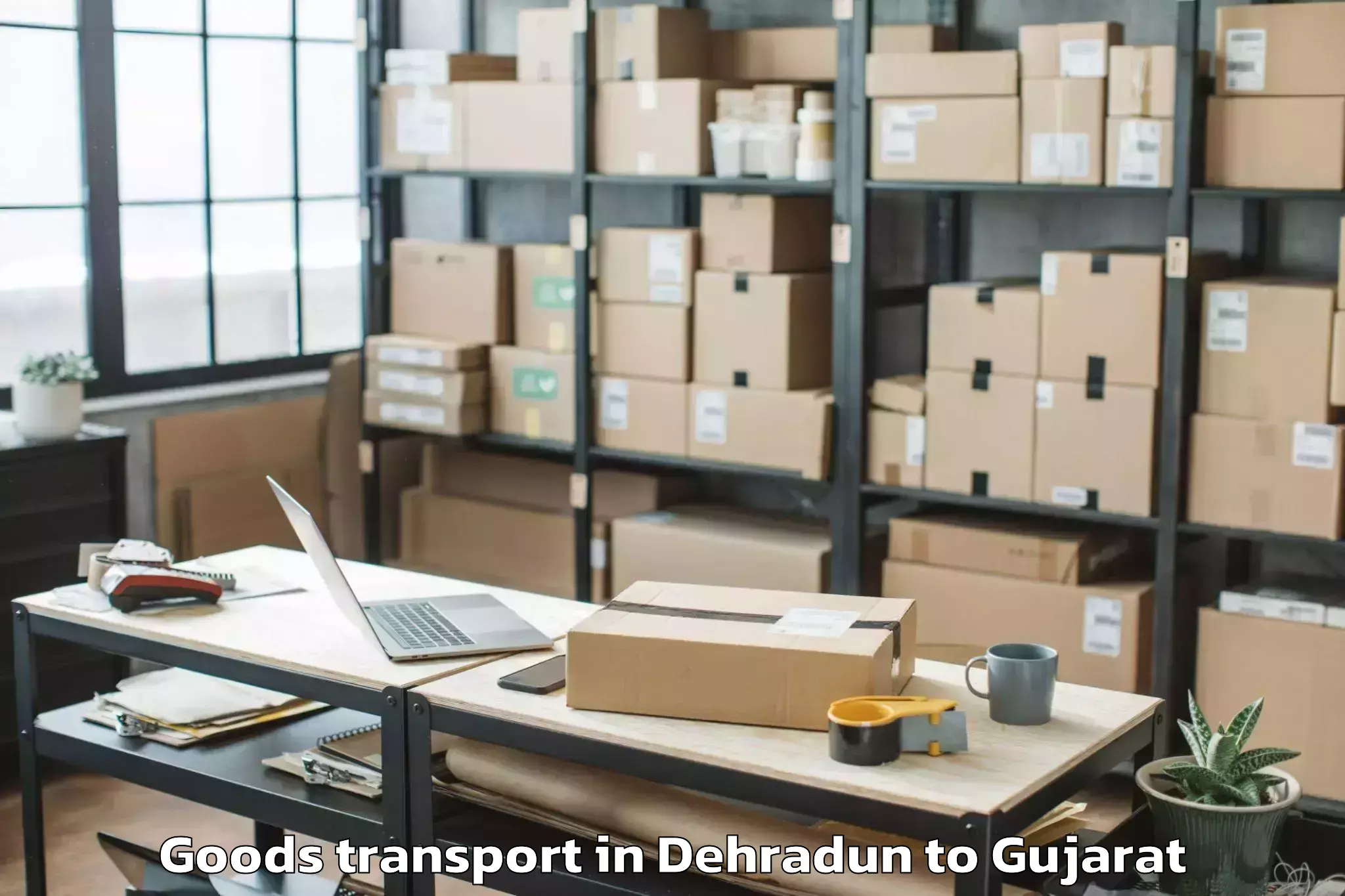 Expert Dehradun to Visavadar Goods Transport